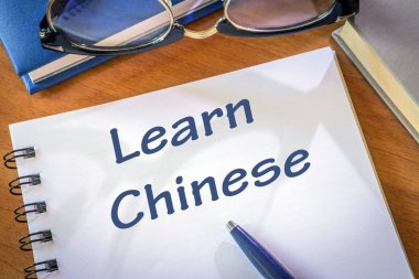 Yazılı bir Not Defteri'nde Çince öğrenin. Eğitim kavramı