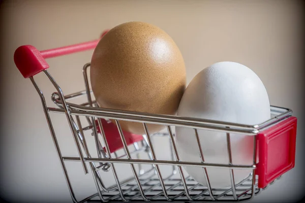 Shopping Cart Two Chicken Eggs Conceptual Image — Stock Photo, Image