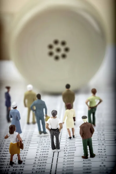 Figures thumbnail against handset old phone isolated on white background, conceptual image — Stock Photo, Image