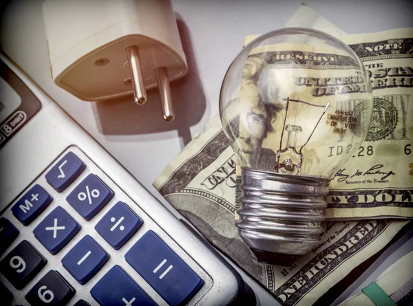 Calculator Money Next Light Bulb Concept Energy Saving — Stock Photo, Image