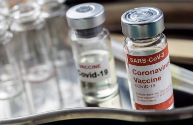 Coronavirus covid-19 experimental vaccine in a laboratory, conceptual image clipart