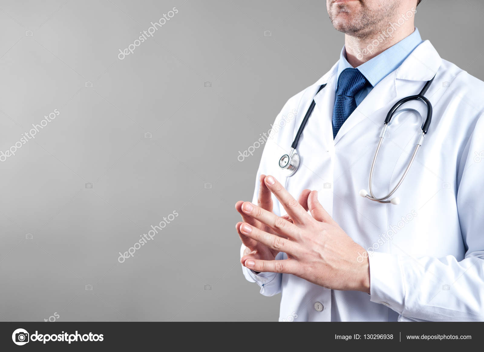 The doctor in the medical apron with stethoscope Stock Photo by  ©damiangretka 130296938