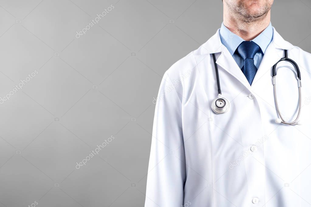 The doctor in the medical apron with stethoscope Stock Photo by  ©damiangretka 130296906