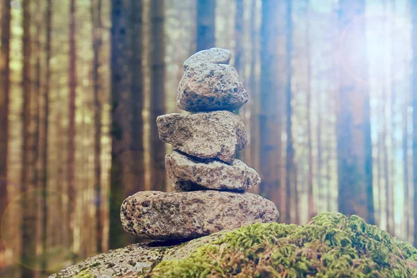 stability of stones in the forest, Stack of rocks (zen meditation and concentration in the nature concept)