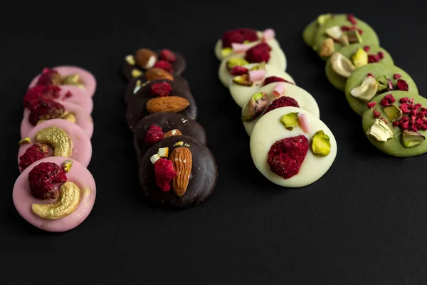Handmade chocolates with cashews and almonds