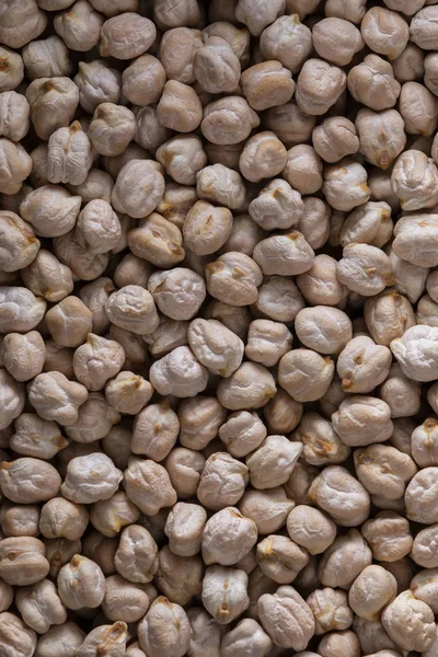 From above uncooked dry chickpea background textured — Stock Photo, Image