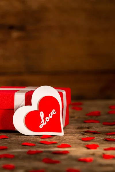 Valentine day gift box with red and white wooden heart shape — ストック写真
