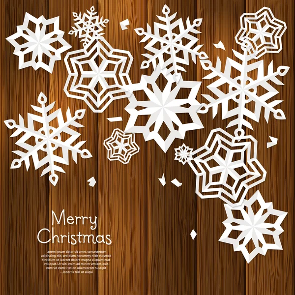 Christmas card with cut out paper snowflakes and wishing text on brown wooden background, wall. Vector. — Stock vektor