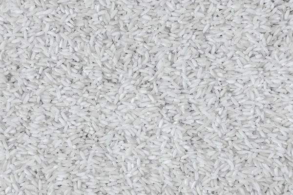 Granos ideales de arroz blanco vista superior — Foto de Stock