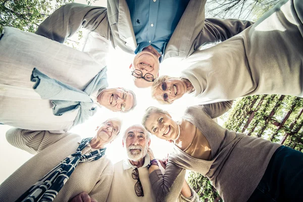 Senior people meeting outdoors — Stock Photo, Image