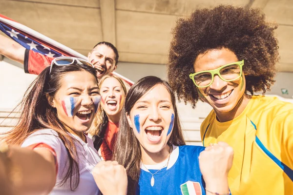 Football fans taking selfie — Stock Photo, Image