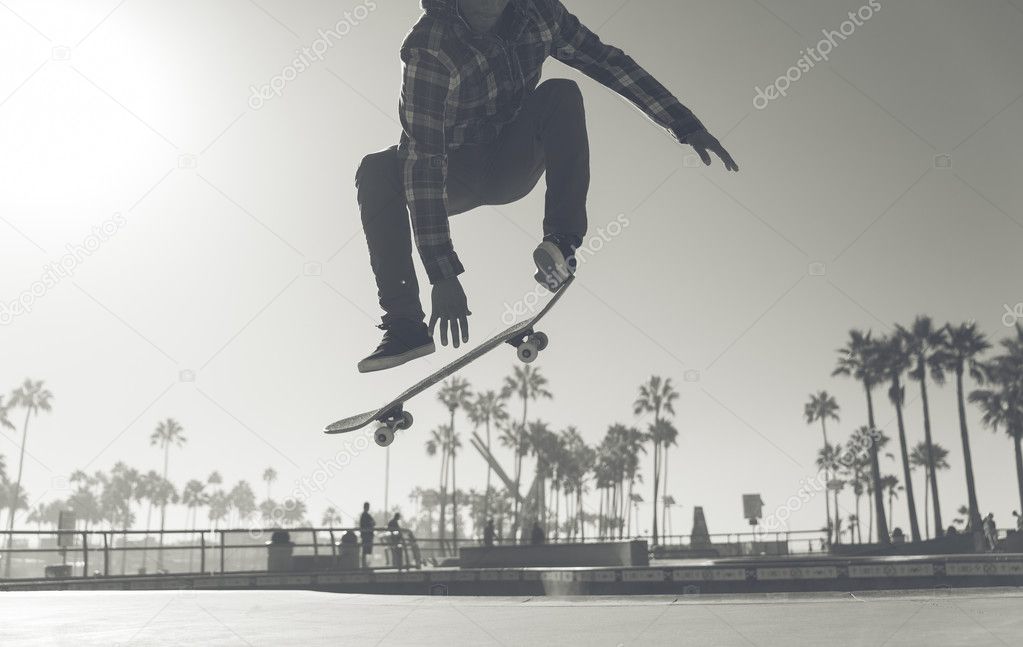 Skater boy practicing at skate park