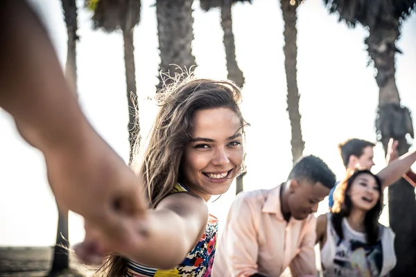 Happy friends on beach — Stock Photo, Image