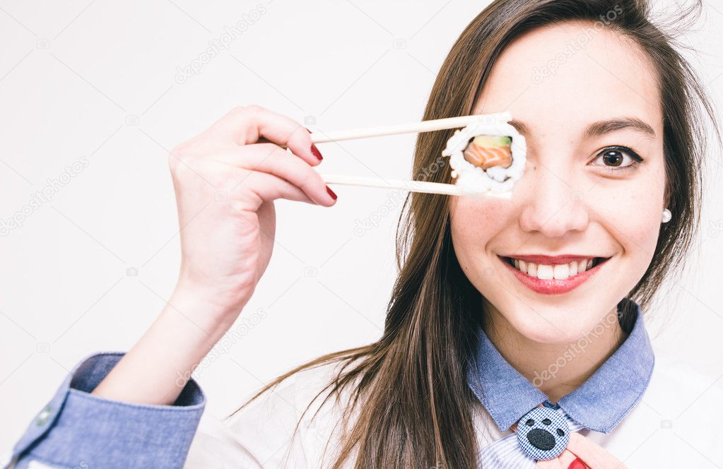 Japanese woman eating sushi