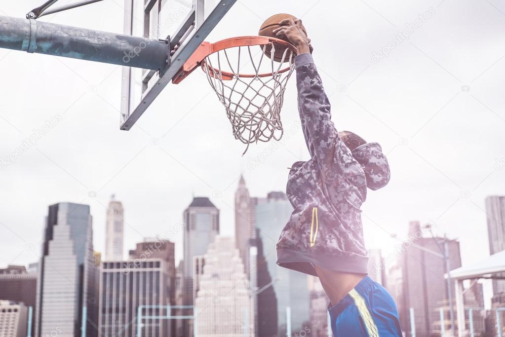 Street basketball athlete on court
