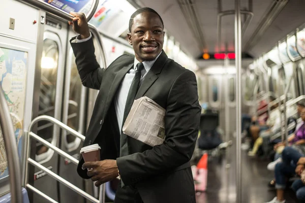 Hombre de negocios guapo en el metro — Foto de Stock