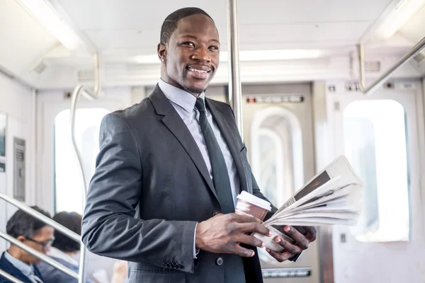 Hombre de negocios guapo en el metro — Foto de Stock