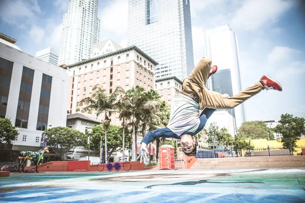 Man doing parkour on street