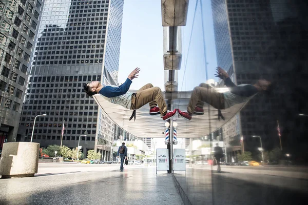 Man doing parkour on street