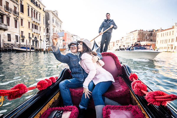 Couple of lovers in venetian gondola