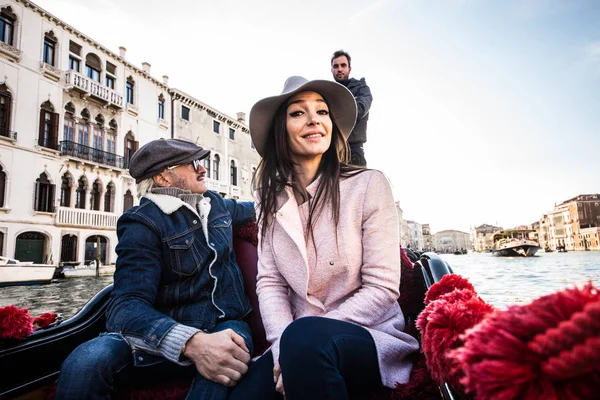 Couple of lovers in venetian gondola — Stock Photo, Image