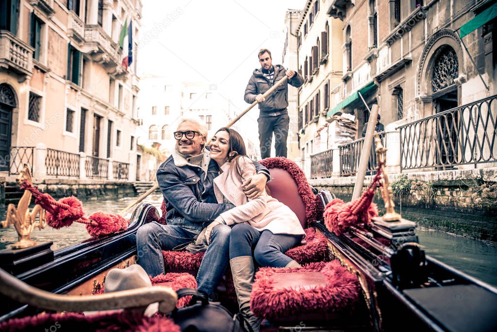 Couple of lovers in venetian gondola