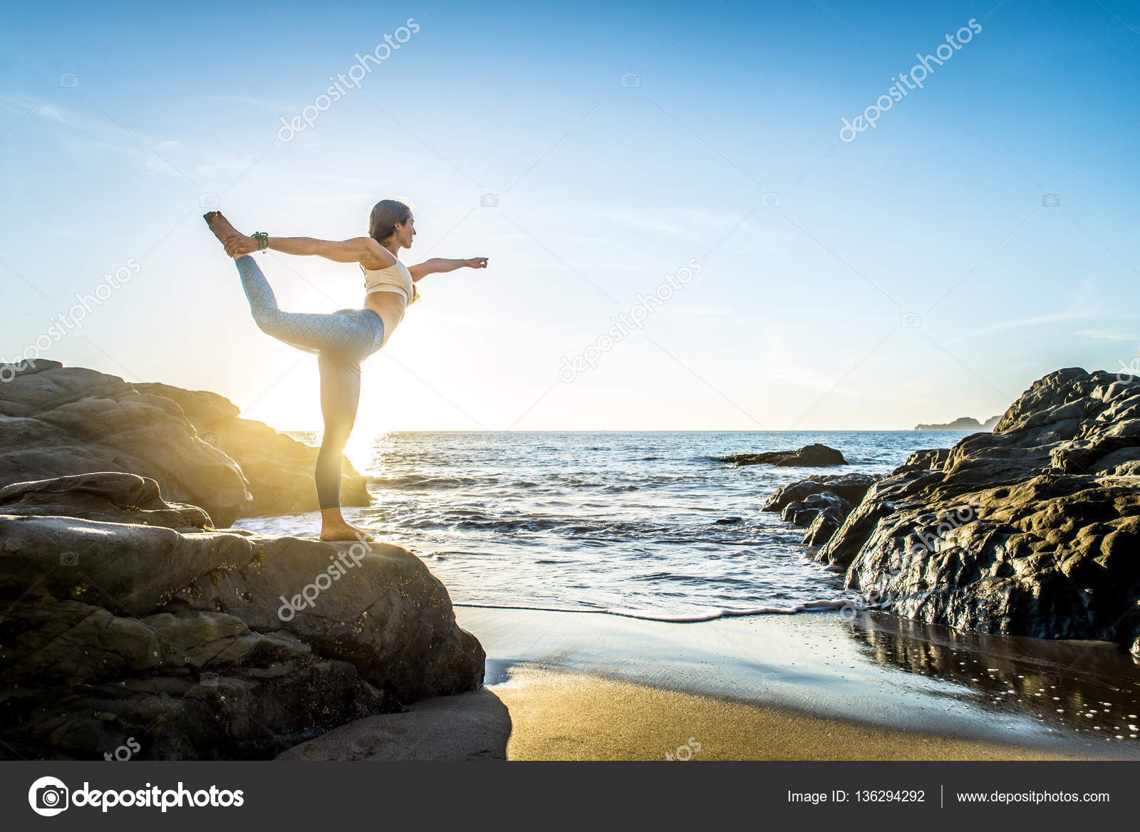 https://st3.depositphotos.com/2853475/13629/i/1600/depositphotos_136294292-stock-photo-woman-practicing-yoga-on-beach.jpg