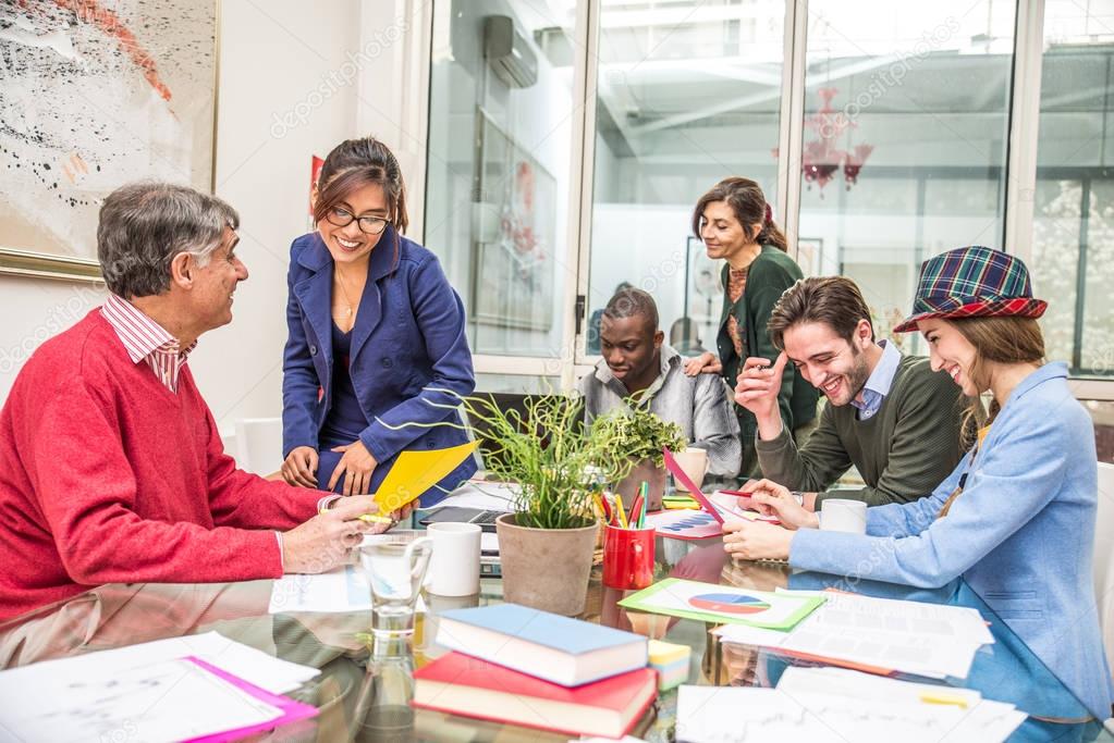 Creative team brainstorming in modern office