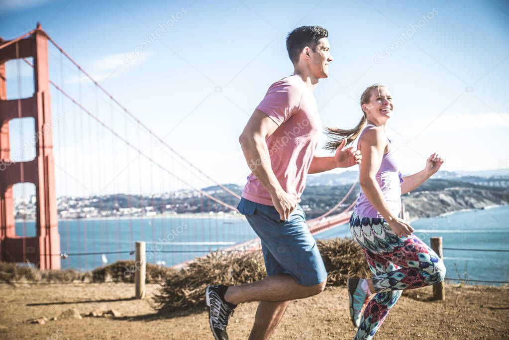 Couple running in San Francisco 