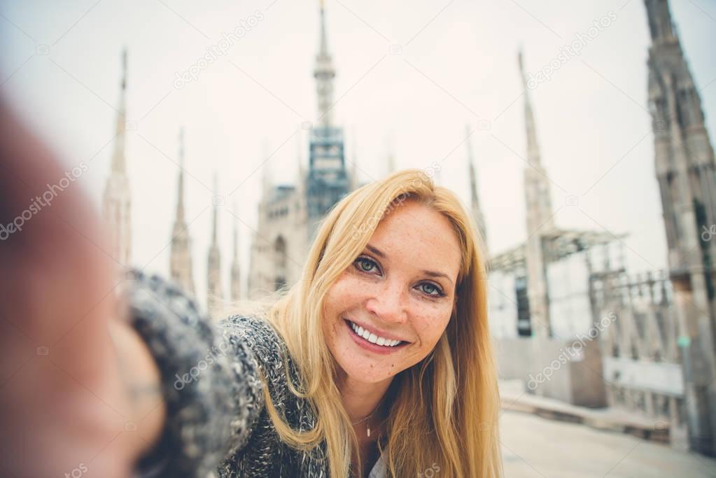 Milan,woman on excursion on the top of the cathedral