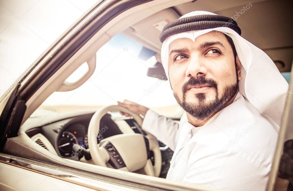 Arabic man in car