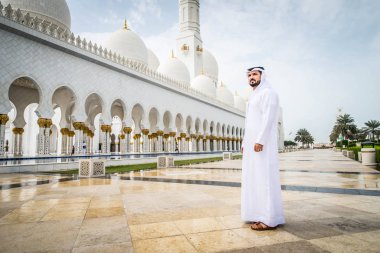 Arabic man at Sheikh Zayed mosque clipart