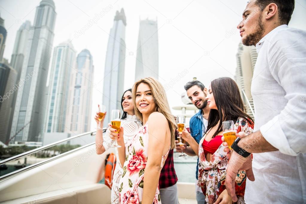 People celebrating on yacht