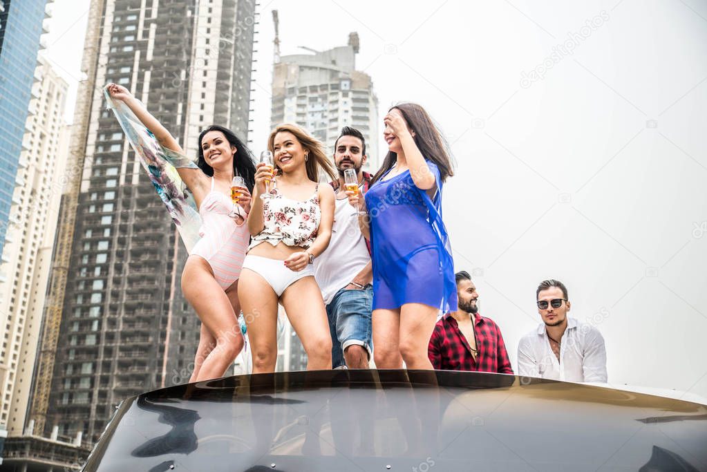 People celebrating on yacht