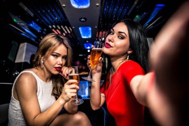 Girls partying in limousine    clipart