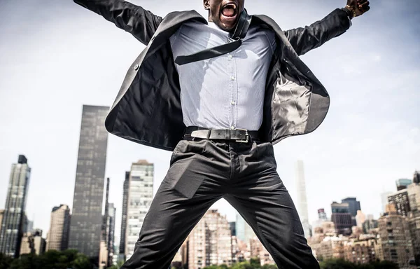Happy businessman jumping — Stock Photo, Image