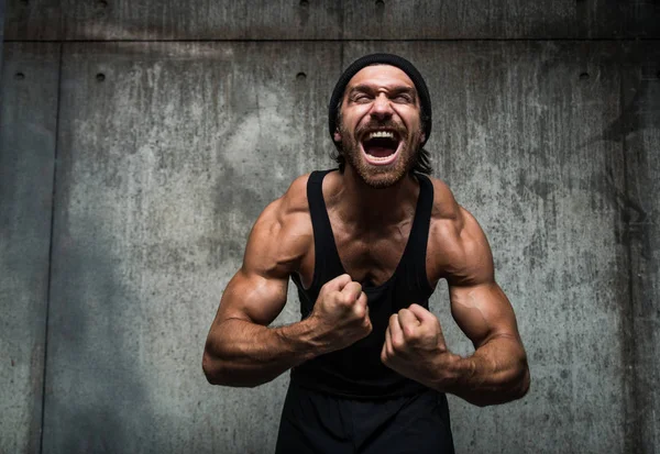 Man training in a gym — Stock Photo, Image