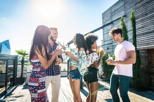 Friends partying on a rooftop