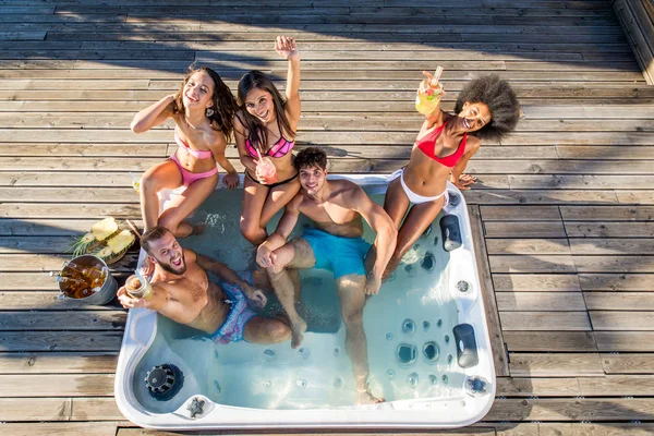 Friends partying on a rooftop — Stock Photo, Image