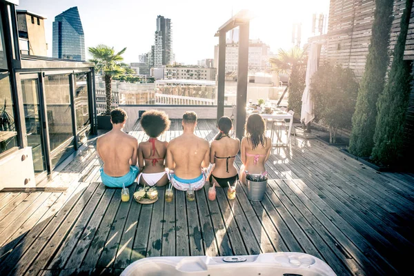 Friends partying on a rooftop