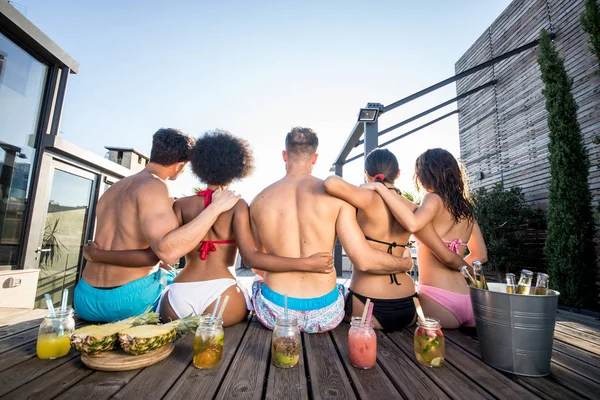 Friends partying on a rooftop