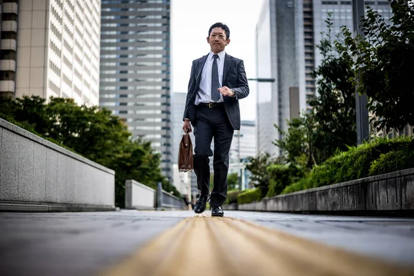 business man walking in Shinjuku