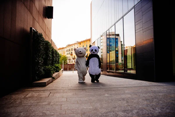 Panda and teddy bear having fun around the city Stock Image