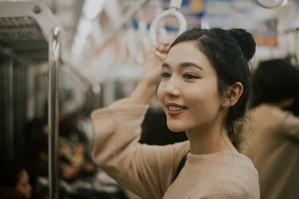 Beautiful japanese woman in the metro station — Stock Photo, Image