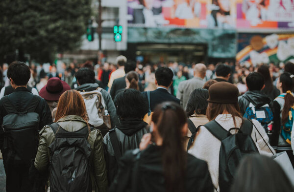 Mass of people crossing the street in Tokyo