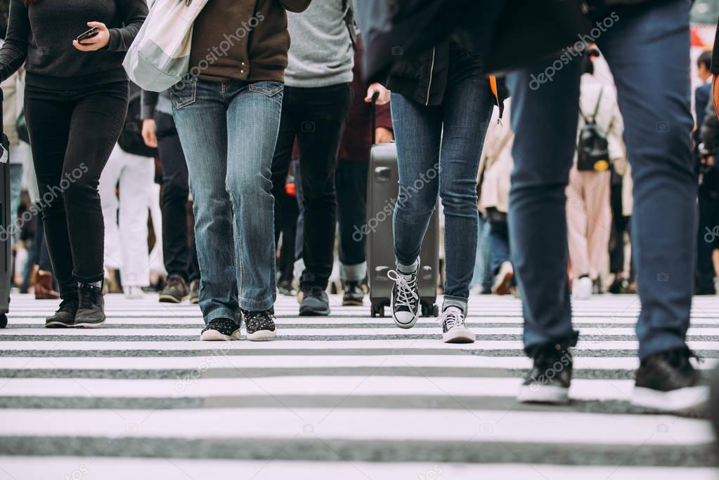 Mass of people crossing the street in Tokyo