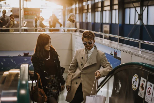 Japanese couple going out. lifestyle moments on the public trans — Stock Photo, Image