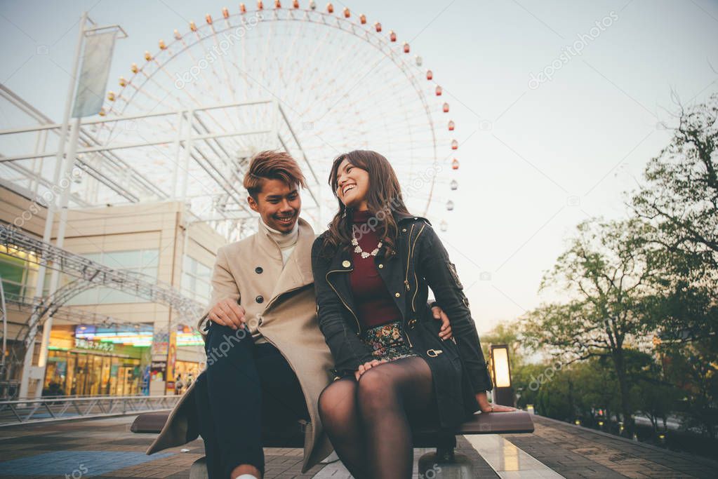 Happy couple spending time together in Osaka