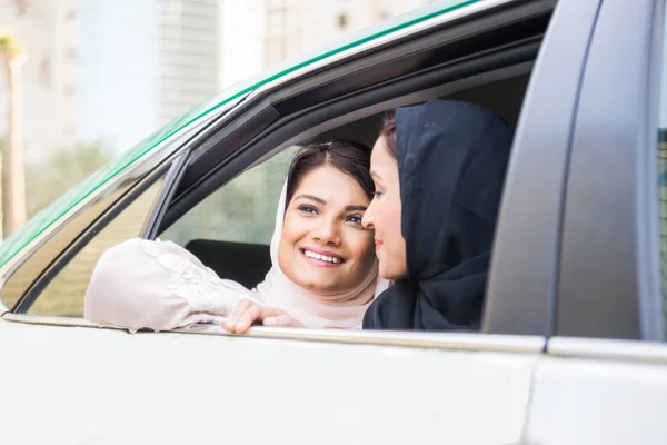 Two arabian girlfriends bonding and having fun — Stock Photo, Image