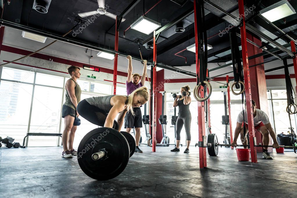 Athletes training in a cross-fit gym